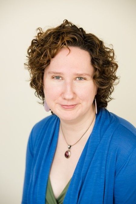 A headshot of Courtney Hill, Owner of Window of Heaven Acupuncture and Yoga